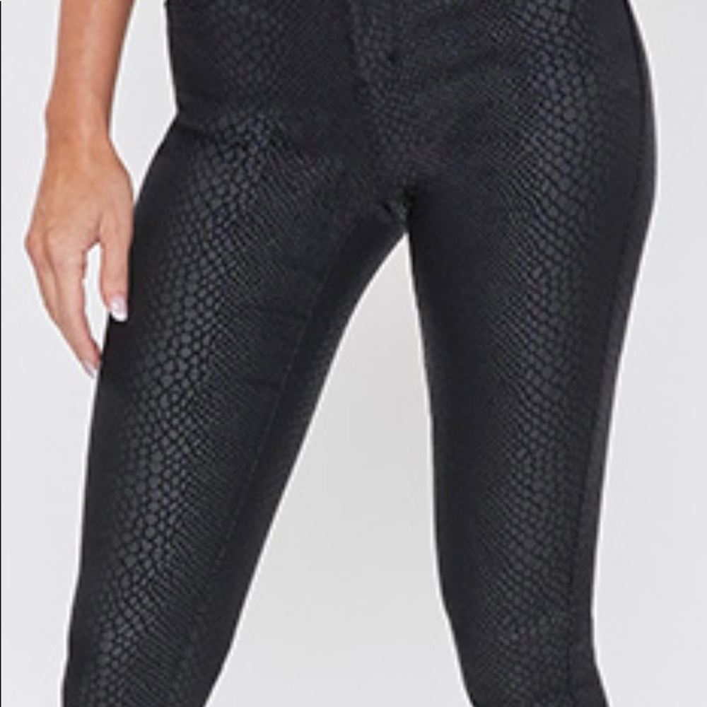 YMI Super stretch coated jeggins leopard black on black. New with tags Sz large